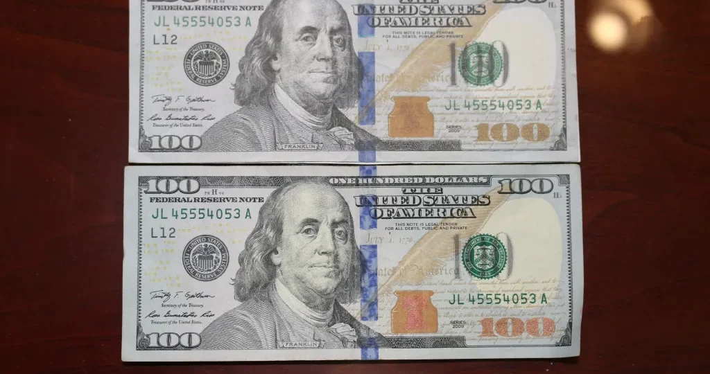 Counterfeit Money VS Real Money